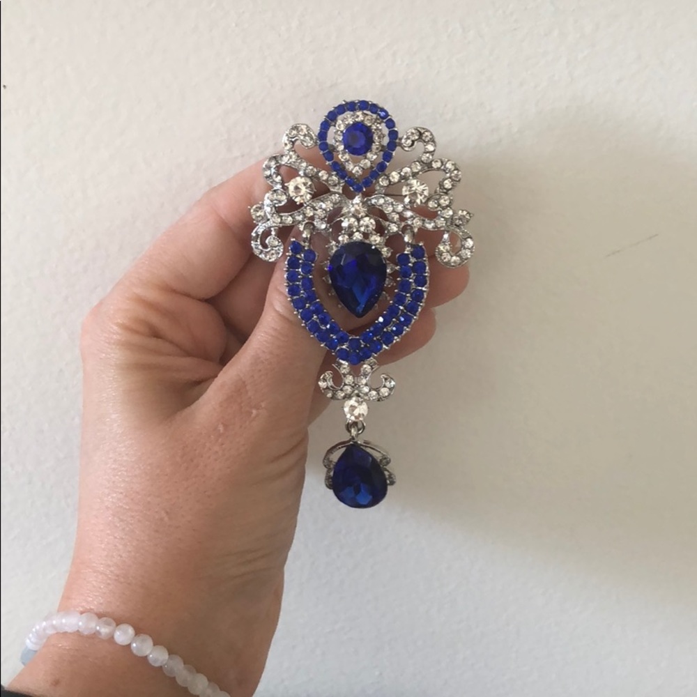 Blue and rhinestone pin